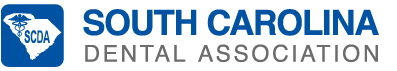 The image displays a logo with text that reads  SOUTH CAROLINA DENTAL ASSOCIATION  against a blue background, suggesting an affiliation with dental professionals in South Carolina.